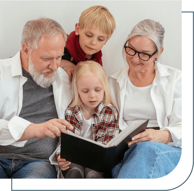 A family reading together on the couch