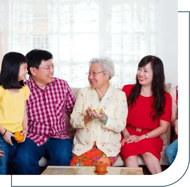 A group of people sitting on top of a couch.